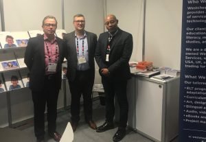 Tim Davies, Kevin J. Gray, and Walter J. Henderson, Jr., at the WES BETT Booth